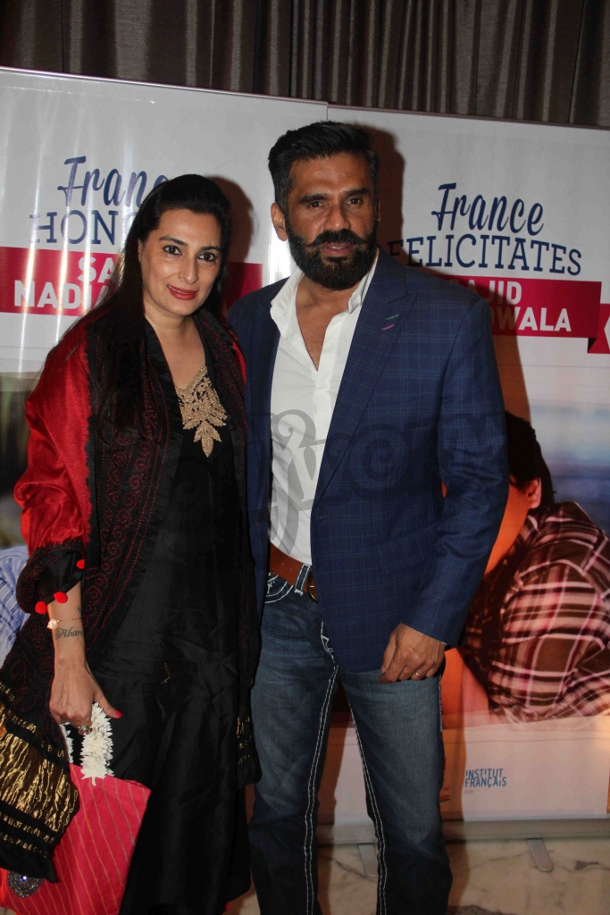 Bollywood actor Suniel Shetty along with his wife Mana Shetty during an event where bollywood filmmaker Sajid Nadiadwala was conferred with an insignia of 'Chevalier des Arts et des Lettres' by Alexandre Ziegler, The Ambassador of France in Mumbai, India on September 21, 2016. (Utsav Devdutta/SOLARIS IMAGES)