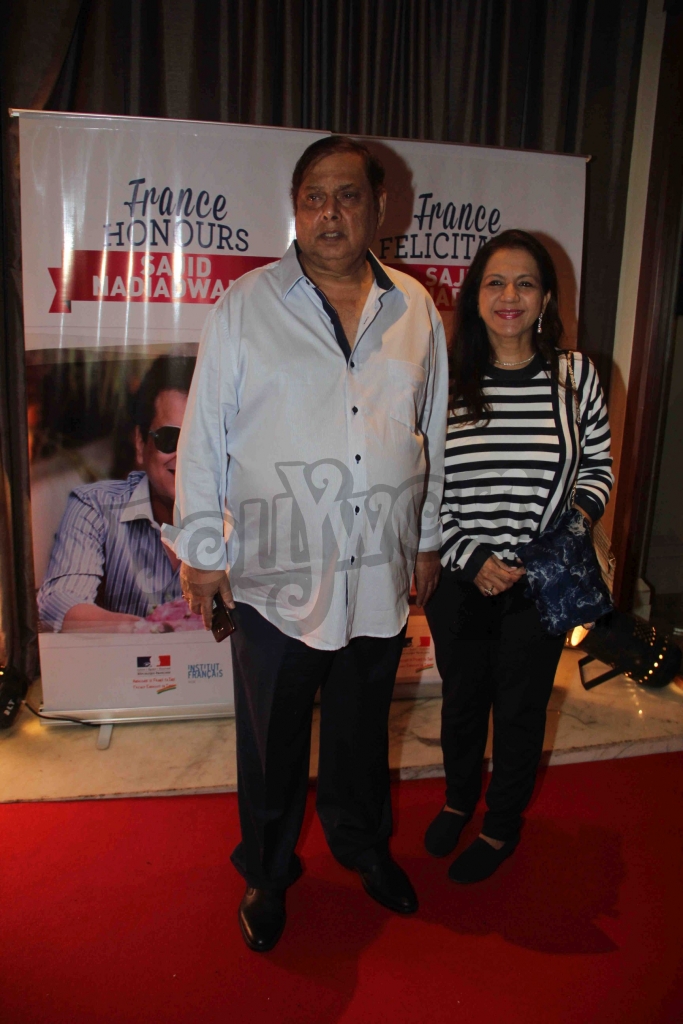 Bollywood filmmaker David Dhawan along with his wife during an event where bollywood filmmaker Sajid Nadiadwala was conferred with an insignia of 'Chevalier des Arts et des Lettres' by Alexandre Ziegler, The Ambassador of France in Mumbai, India on September 21, 2016. (Utsav Devdutta/SOLARIS IMAGES)