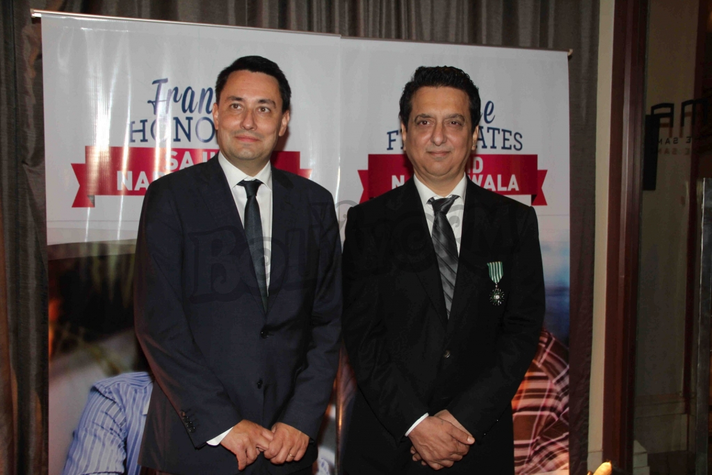 The Ambassador of France, Alexandre Ziegler and Bollywood filmmaker Sajid Nadiadwala during an event where bollywood filmmaker Sajid Nadiadwala was conferred with an insignia of 'Chevalier des Arts et des Lettres' by Alexandre Ziegler, The Ambassador of France in Mumbai, India on September 21, 2016. (Utsav Devdutta/SOLARIS IMAGES)